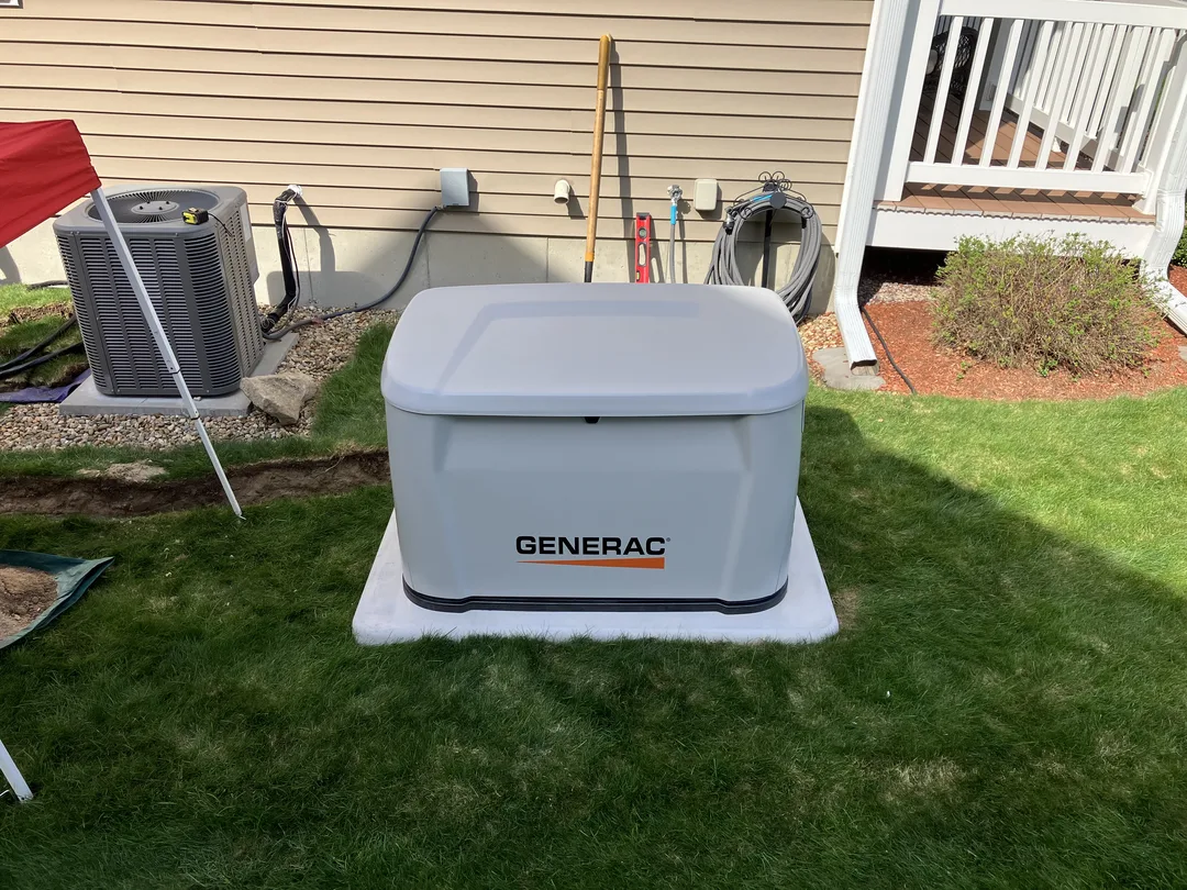 14kW Generac generator installation completed in Hudson NH by licensed electricians at Malley Electric.